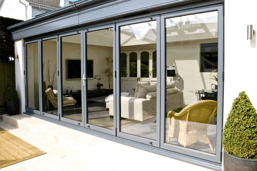 bi-folding light grey on a conservatory