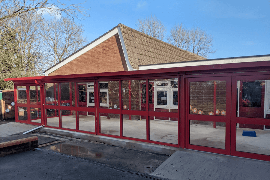 red framed aluminum windows